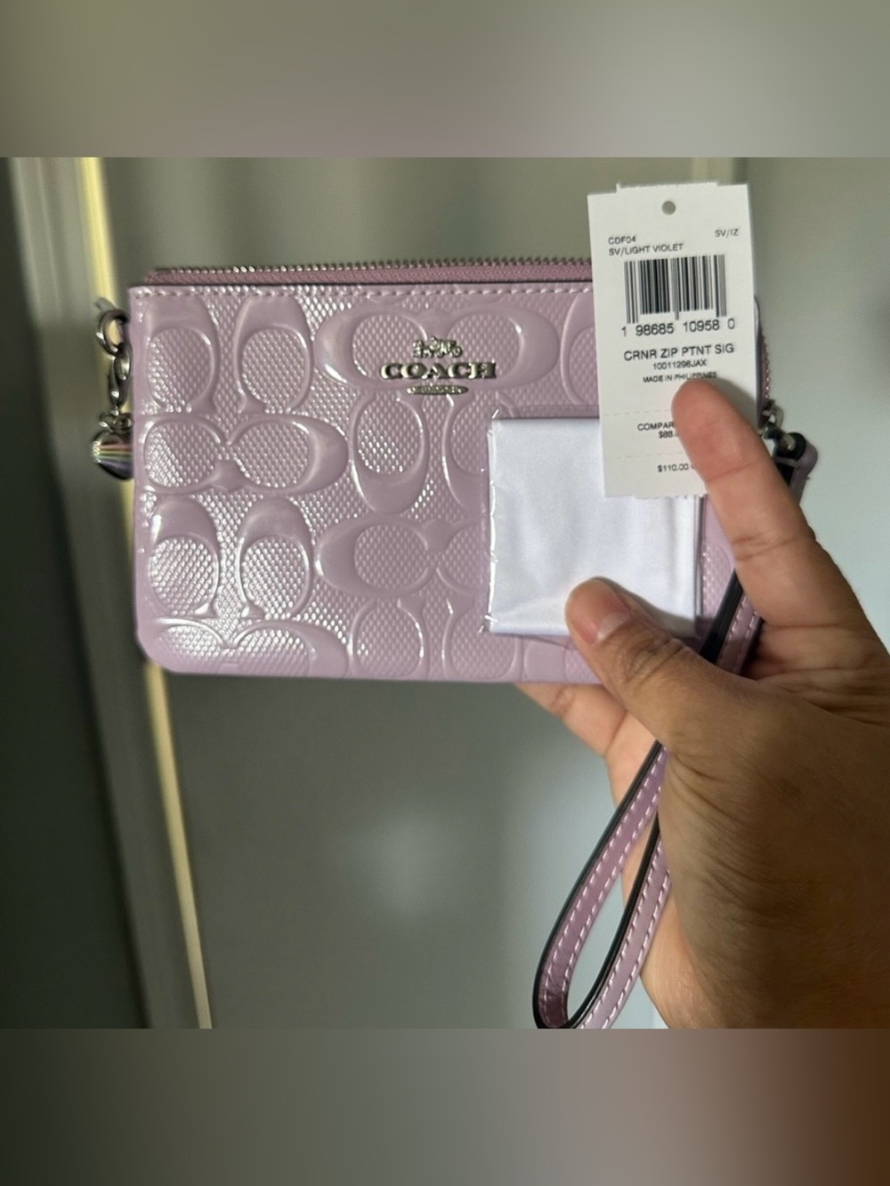 Coach corner zip Wristlet wallet with heart Charm